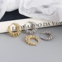 Hollow Spring Twist Hoop Earrings - MLYH597